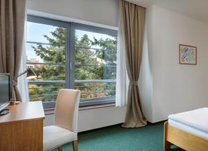 Postel nebo postele na pokoji v ubytování Hotel Oya