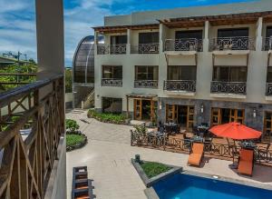 an aerial view of a hotel with a swimming pool at Palo Santo Galápagos Hotel in Puerto Ayora