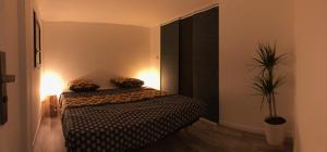 Postel nebo postele na pokoji v ubytování Tiny House sur la Côte d’Azur