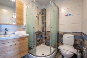 Koupelna v ubytování Elimia Suites & Studios