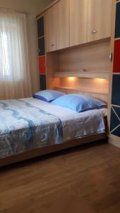 Posteľ alebo postele v izbe v ubytovaní apartmani vraničić + 15 fotografií