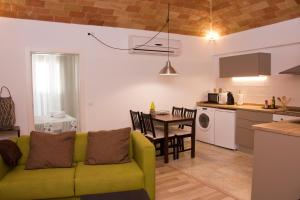 Kuchyň nebo kuchyňský kout v ubytování Can Pauet Apartaments