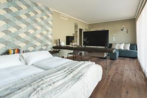 TV a/nebo společenská místnost v ubytování 21Barra5 Guest House + 37 fotografií