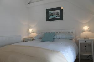 Voodi või voodid majutusasutuse Hillside Cottage toas