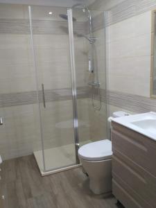 Koupelna v ubytování APARTAMENTOS CAMINO SANTO TORIBIO