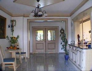 Kuchyň nebo kuchyňský kout v ubytování Hotel Jagermo