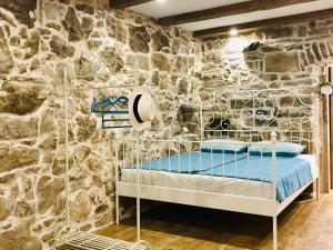 Postel nebo postele na pokoji v ubytování APARTMAN Captain Bervida Murter