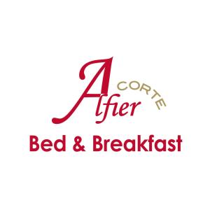 ein Schild für ein Bed & Breakfast mit der Nummer vier in der Unterkunft B&B Corte Alfier in Mortegliano