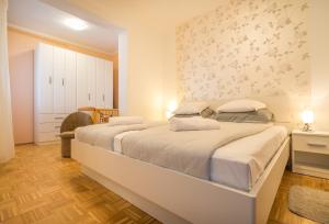 Postel nebo postele na pokoji v ubytování Apartment Steblaj