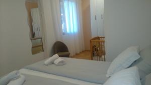 Postel nebo postele na pokoji v ubytování Apartment Steblaj