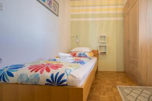 Postel nebo postele na pokoji v ubytování Apartment Steblaj