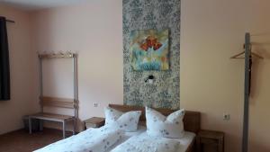 Postel nebo postele na pokoji v ubytování Hotel Wittenberg-Hotel Garni