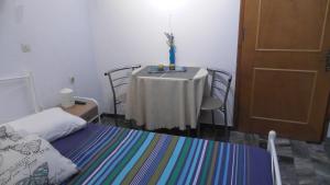 Кровать или кровати в номере Nancy Rooms