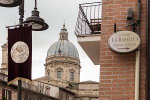Certifikát, hodnocení, plakát nebo jiný dokument vystavený v ubytování Camere La Basilica