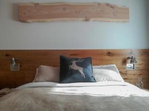 Postel nebo postele na pokoji v ubytování Ciasa David Marebbe