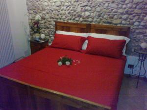 A bed or beds in a room at B&B Corte Alfier