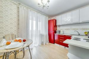 Köök või kööginurk majutusasutuses Helen Apartments Galleria Minsk