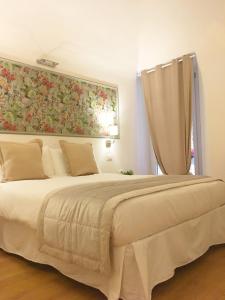 Posteľ alebo postele v izbe v ubytovaní M SuiteApartment Roma + 24 fotografií