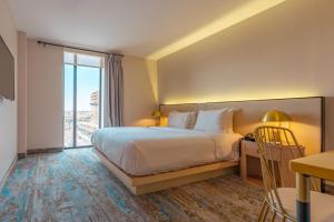 Voodi või voodid majutusasutuse The Parc Hotel toas