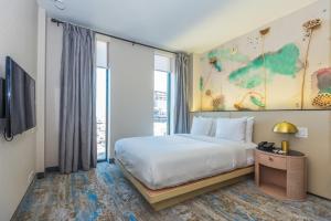 Voodi või voodid majutusasutuse The Parc Hotel toas