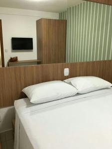 Postel nebo postele na pokoji v ubytování Encontro das Aguas + 23 fotografií