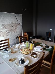 a table with plates of food on top of it at B&B Cherry Season in Lanciano