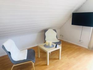 TV a/nebo společenská místnost v ubytování Blackforest Home Gengenbach nahe Europapark Rust