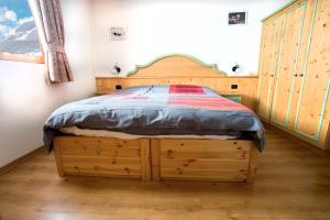 Postel nebo postele na pokoji v ubytování Chalet la Coccinella