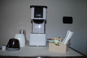a coffee maker sitting on top of a counter at Agriturismo Pirro in Troia