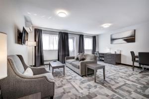 TV a/nebo společenská místnost v ubytování Terrasse Royale Hotel