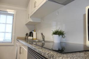 A cozinha ou cozinha compacta de Vigia's Guest House