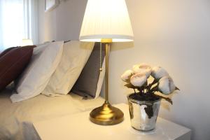 Cama ou camas em um quarto em Vigia's Guest House
