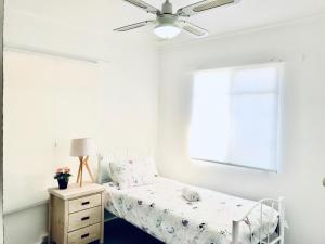 A bed or beds in a room at Jesson Crescent Dandenong Cozy House