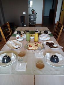 a table with plates of food on top of it at B&B Cherry Season in Lanciano