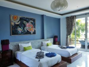 Voodi või voodid majutusasutuse In Touch Resort toas