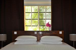 Cama ou camas em um quarto em Jan Kok Lodges