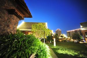 A garden outside Mangrove Tree Resort World Sanya Bay-Coconut
