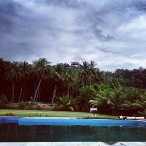 Bazén v ubytování Karang Aji Beach Villa nebo v jeho okolí