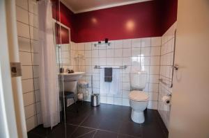 Vannituba majutusasutuses Jafa's Motels +23 fotot