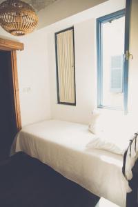 Voodi või voodid majutusasutuse The Iskemleci Guest House toas