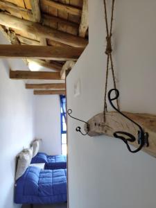 Postel nebo postele na pokoji v ubytování DORMERO Albergue Hidalgos Hospital de Órbigo