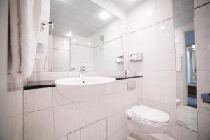 Ванна кімната в Comwell Hvide Hus Aalborg