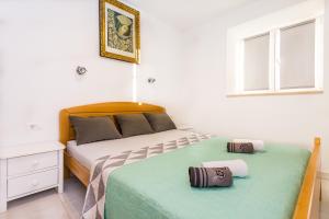 Postel nebo postele na pokoji v ubytování Urban Luxury Suites Juricevic