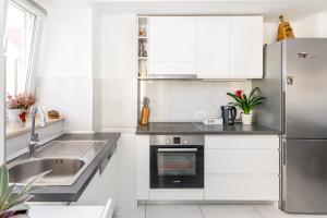 Kuchyň nebo kuchyňský kout v ubytování Urban Luxury Suites Juricevic