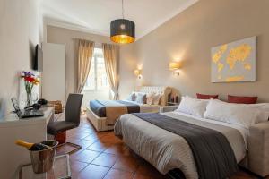 A bed or beds in a room at Veneto Prestige Apartment