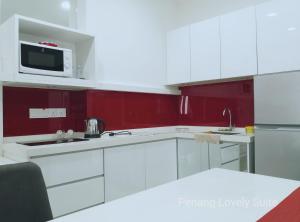 Kuhinja ili čajna kuhinja u objektu Penang Studio Suite in Georgetown