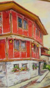 una pintura de una casa roja con flores en las ventanas en Guest House Maria en Koprivshtitsa