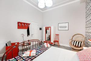 Postel nebo postele na pokoji v ubytování Jacaranda