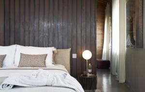 Letto o letti in una camera di Fornace Suite