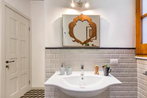 Koupelna v ubytování Jacaranda + 36 fotografií